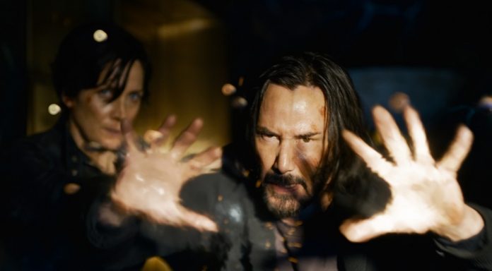 Carrie-Anne Moss und Keanu Reeves in Matrix Trilogie